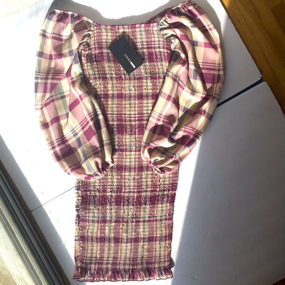 Fashion Nova’s Casually Waiting Smocked Mini Dress